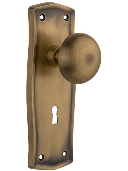 Prairie Design Mortise Lock Set With Round Brass Knobs in Antique Brass.